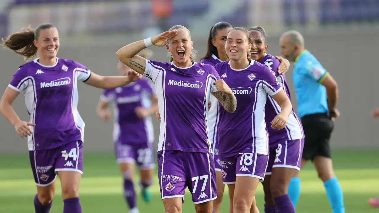 Fiorentina players celebrating a goal Fiorentina players celebrating a goal