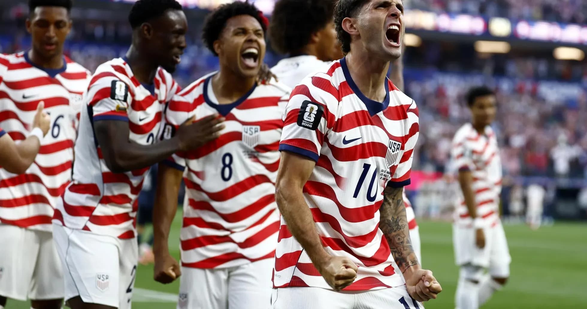 USA players celebrating during World Cup match USA players celebrating during World Cup match