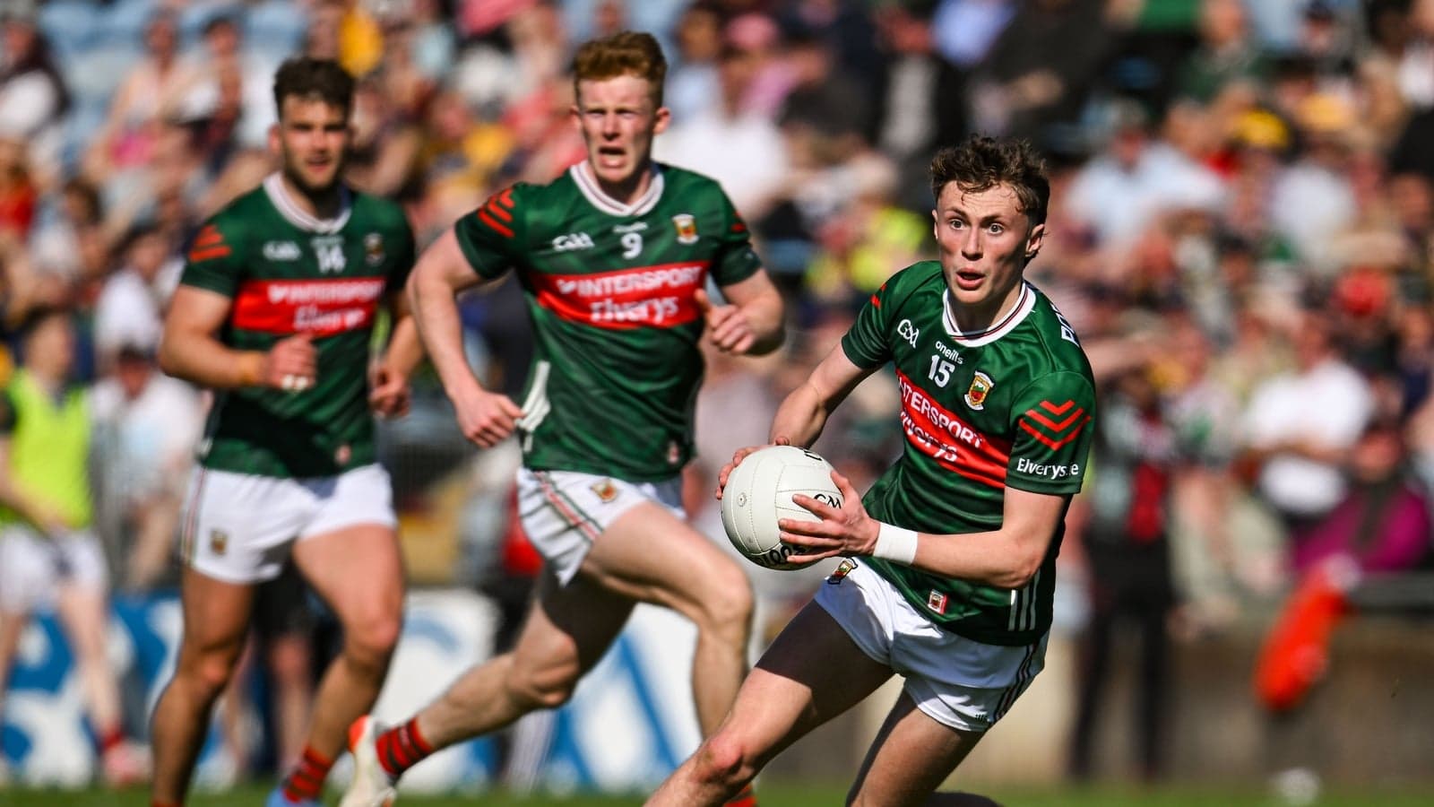 Mayo players in action during a football match Mayo players in action during a football match