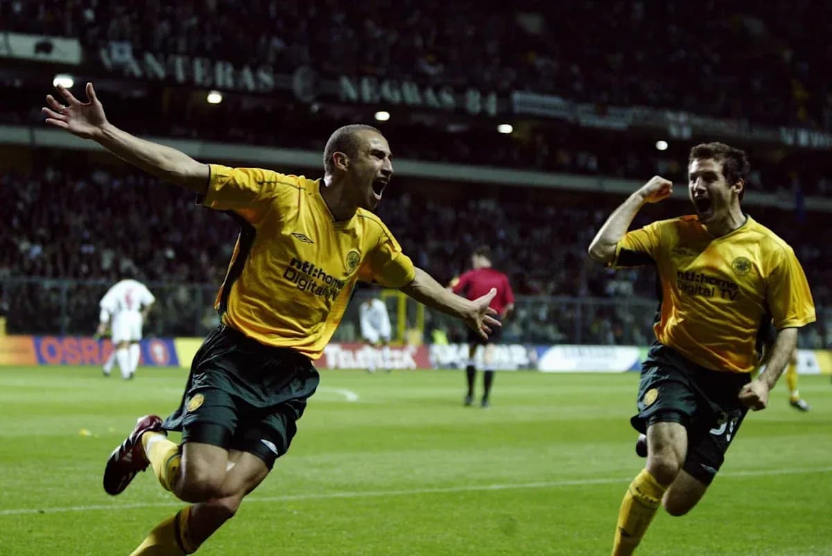 Players celebrating a goal during a football match Players celebrating a goal during a football match