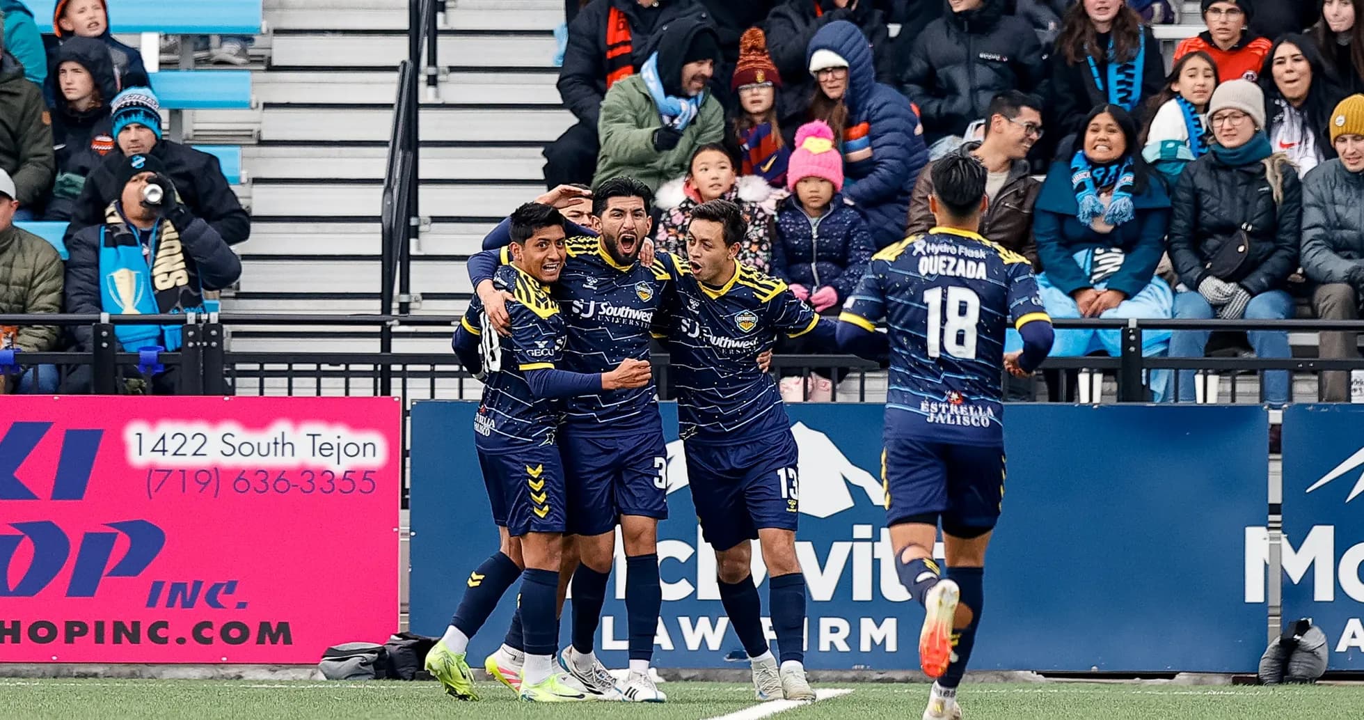 Players celebrating a goal during USL match Players celebrating a goal during USL match