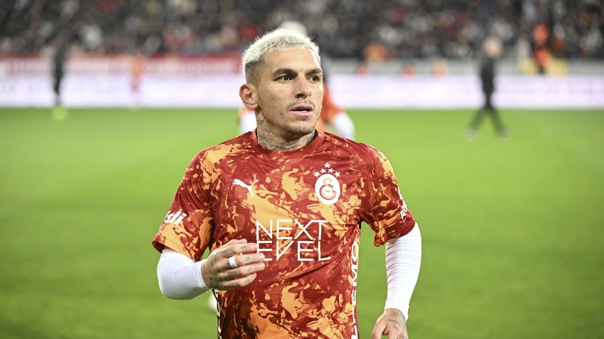 Player in Galatasaray jersey on the field Player in Galatasaray jersey on the field