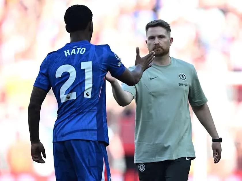 Player Hato greeting coach during match substitution Player Hato greeting coach during match substitution