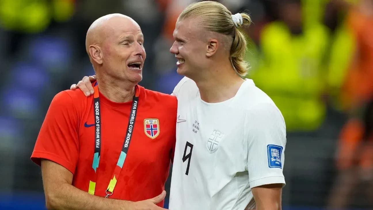 Coach and player celebrating after match Coach and player celebrating after match