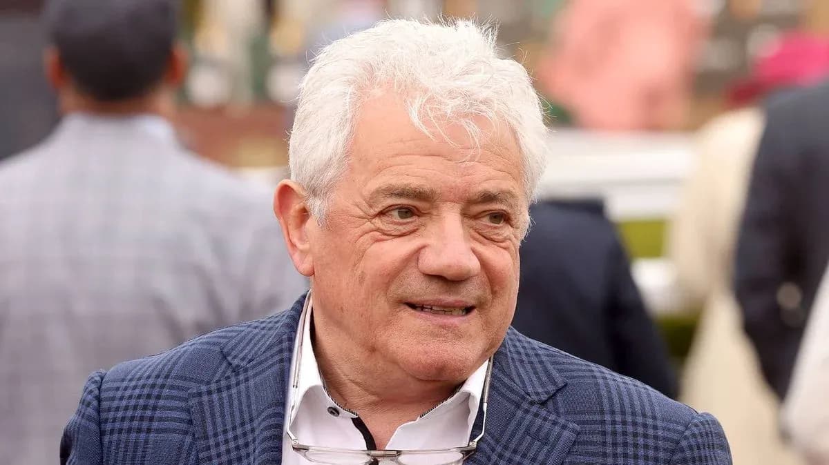 Man with white hair in a checkered jacket Man with white hair in a checkered jacket
