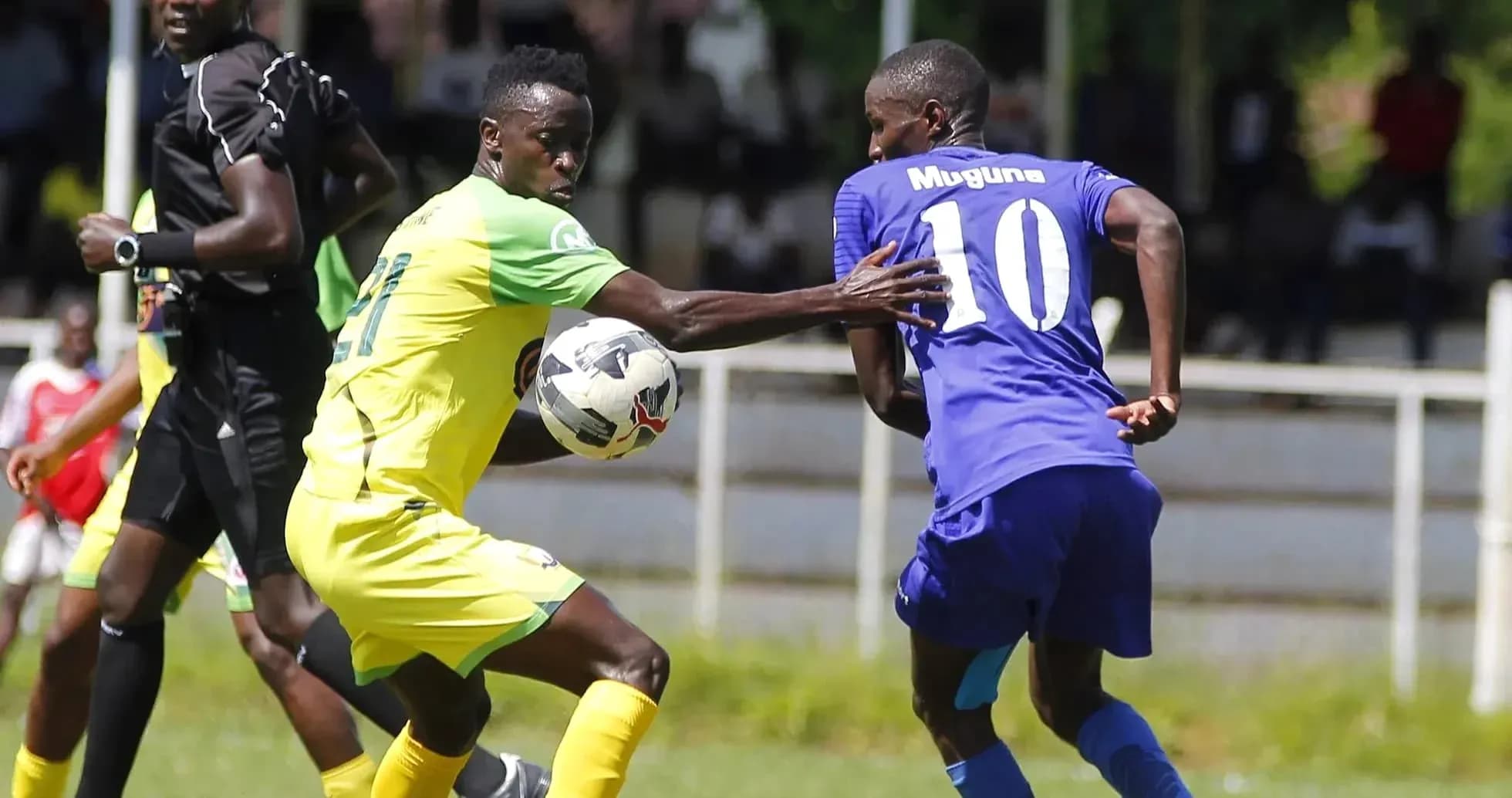 Shabana player challenges KCB player for the ball Shabana player challenges KCB player for the ball