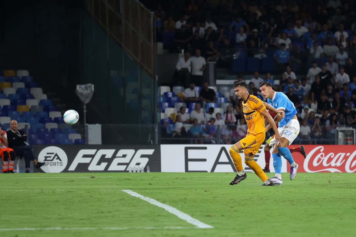 Pisa player chasing Napoli opponent during match Pisa player chasing Napoli opponent during match