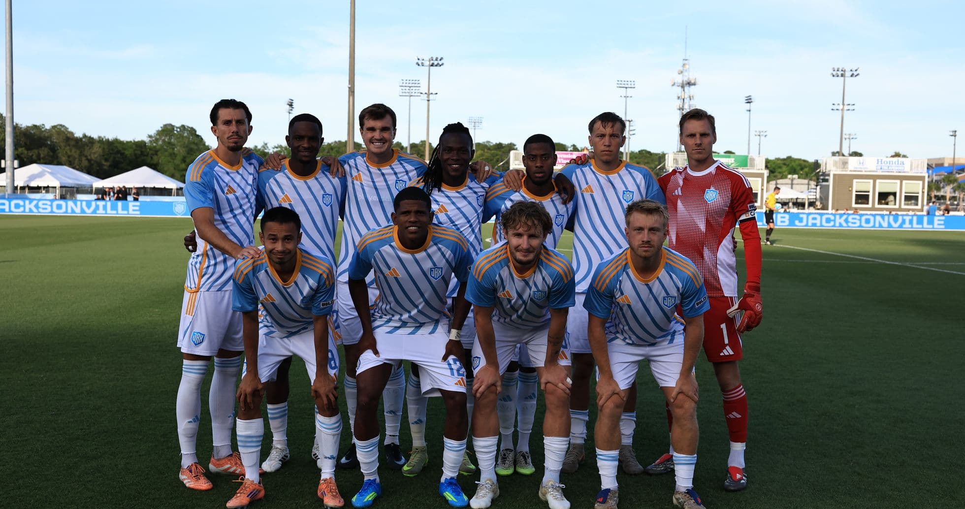 Sporting JAX team posing for photo before match Sporting JAX team posing for photo before match