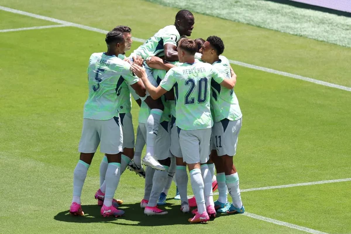 Players celebrating a goal during match Players celebrating a goal during match