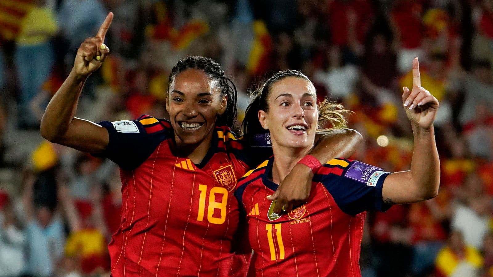 Two Spanish players celebrating a goal during match Two Spanish players celebrating a goal during match