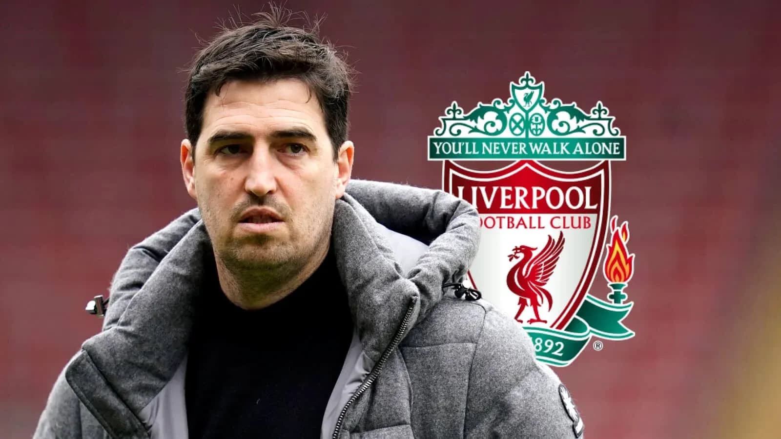Man in a jacket near Liverpool FC logo Man in a jacket near Liverpool FC logo