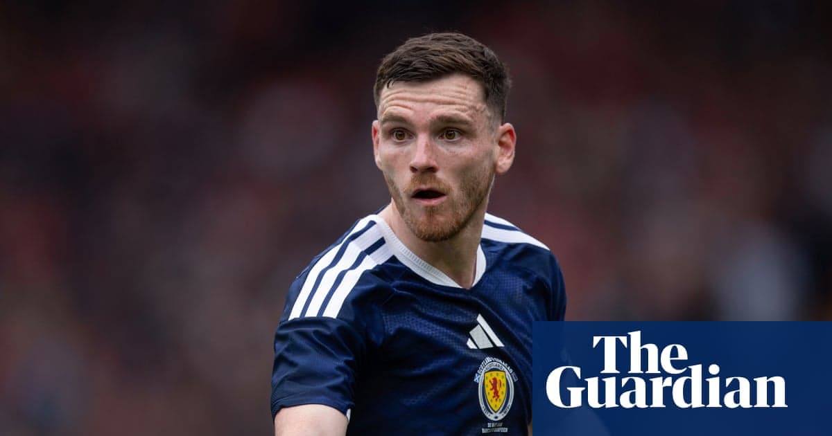 Scottish player in blue kit during match Scottish player in blue kit during match