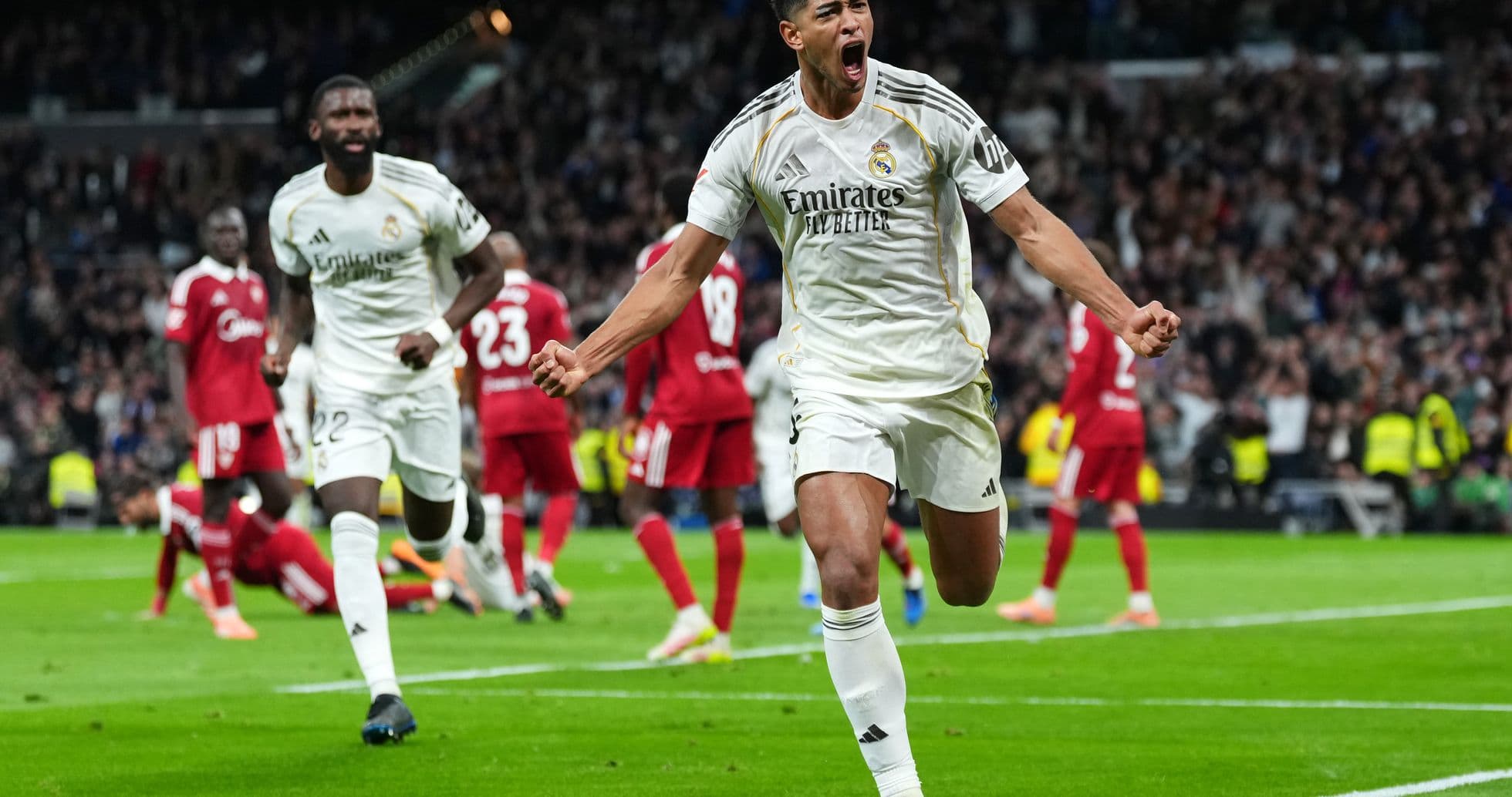 Real Madrid player celebrating a goal Real Madrid player celebrating a goal