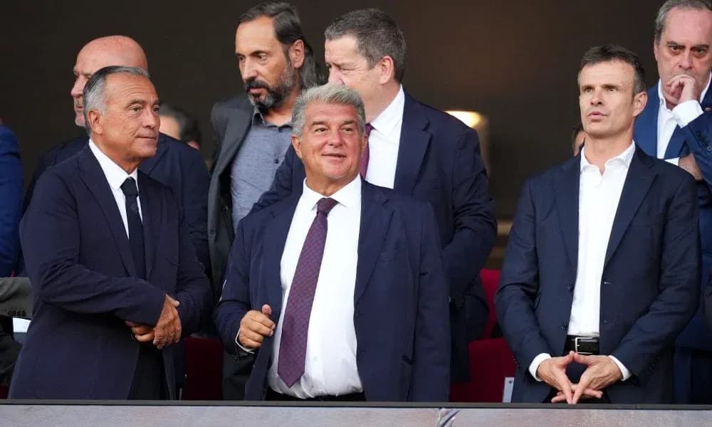 Group of executives in stadium box watching match Group of executives in stadium box watching match