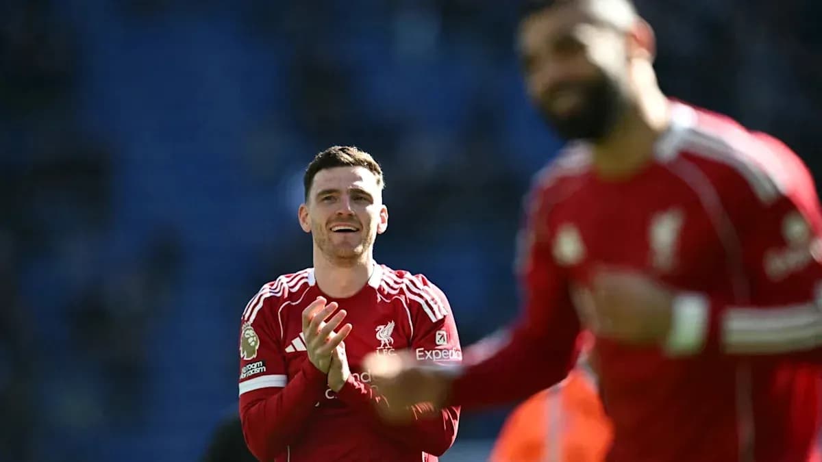 Liverpool players celebrating on the pitch Liverpool players celebrating on the pitch