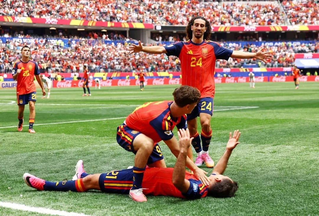 Spanish players celebrating a goal during match Spanish players celebrating a goal during match