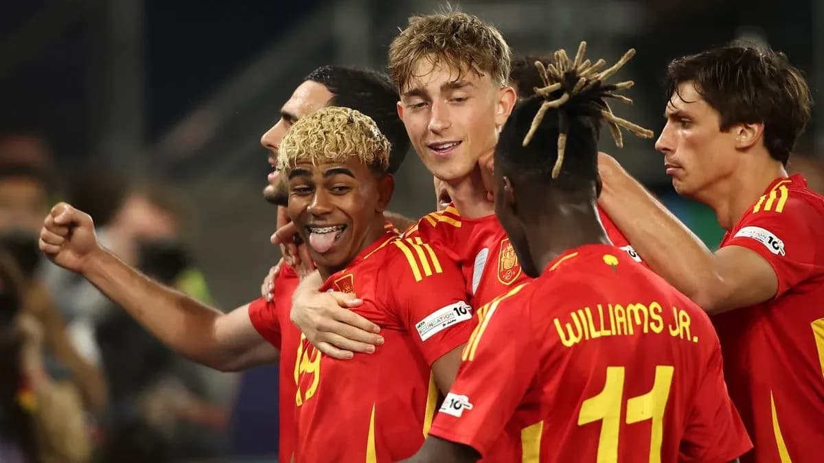 Spanish players celebrating a goal during match Spanish players celebrating a goal during match