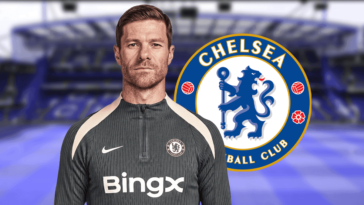 Coach in Chelsea training kit with club logo Coach in Chelsea training kit with club logo