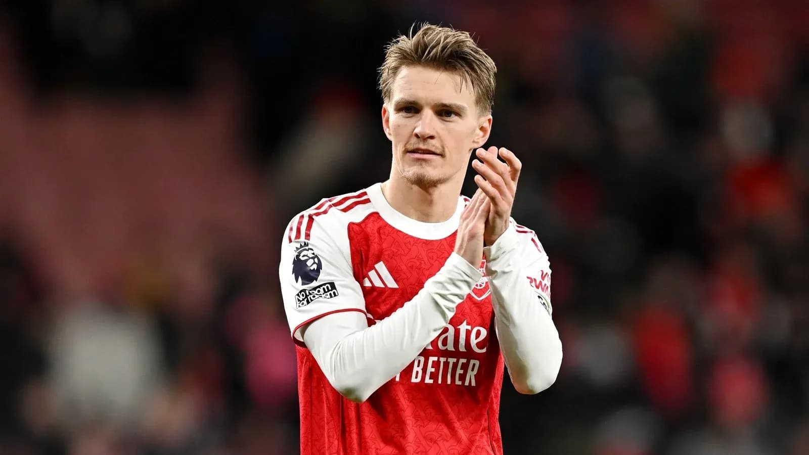 Player applauding fans after the match Player applauding fans after the match