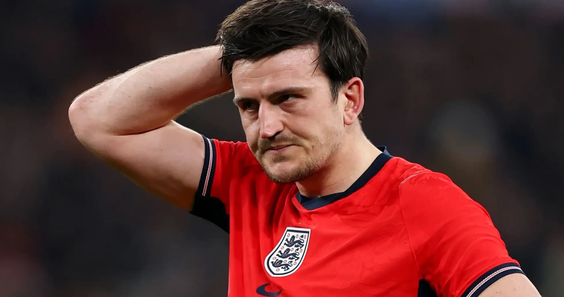 Player with hand on head during match Player with hand on head during match