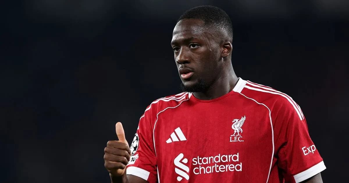 Player in Liverpool jersey giving thumbs up gesture Player in Liverpool jersey giving thumbs up gesture