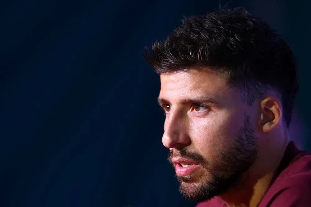Player speaking at press conference, close-up shot Player speaking at press conference, close-up shot