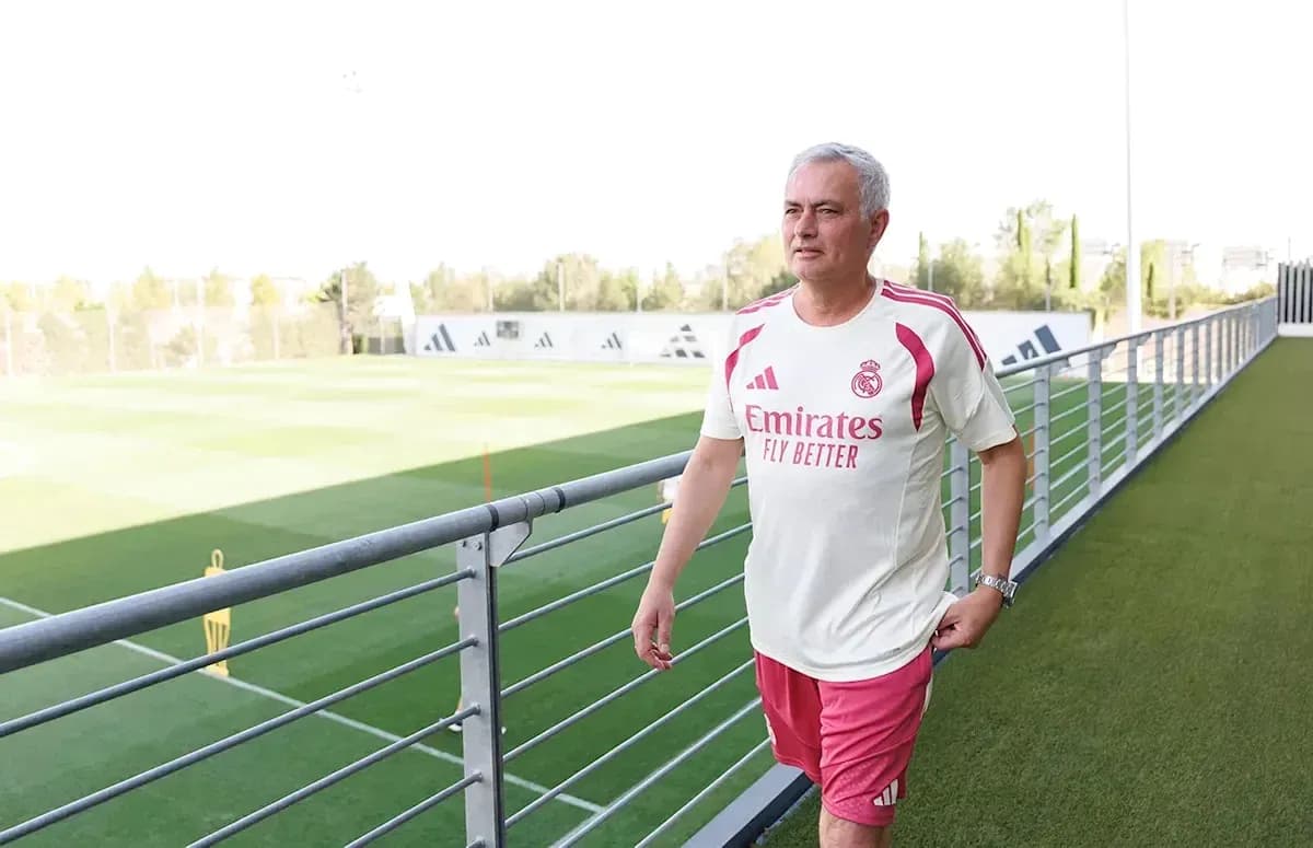 Coach walking on training pitch at Real Madrid Coach walking on training pitch at Real Madrid