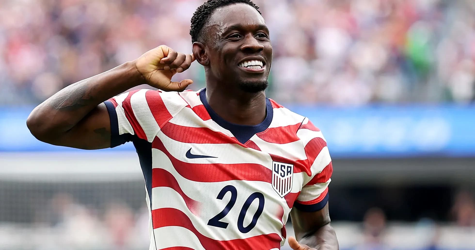 Player celebrating in USA jersey during match Player celebrating in USA jersey during match