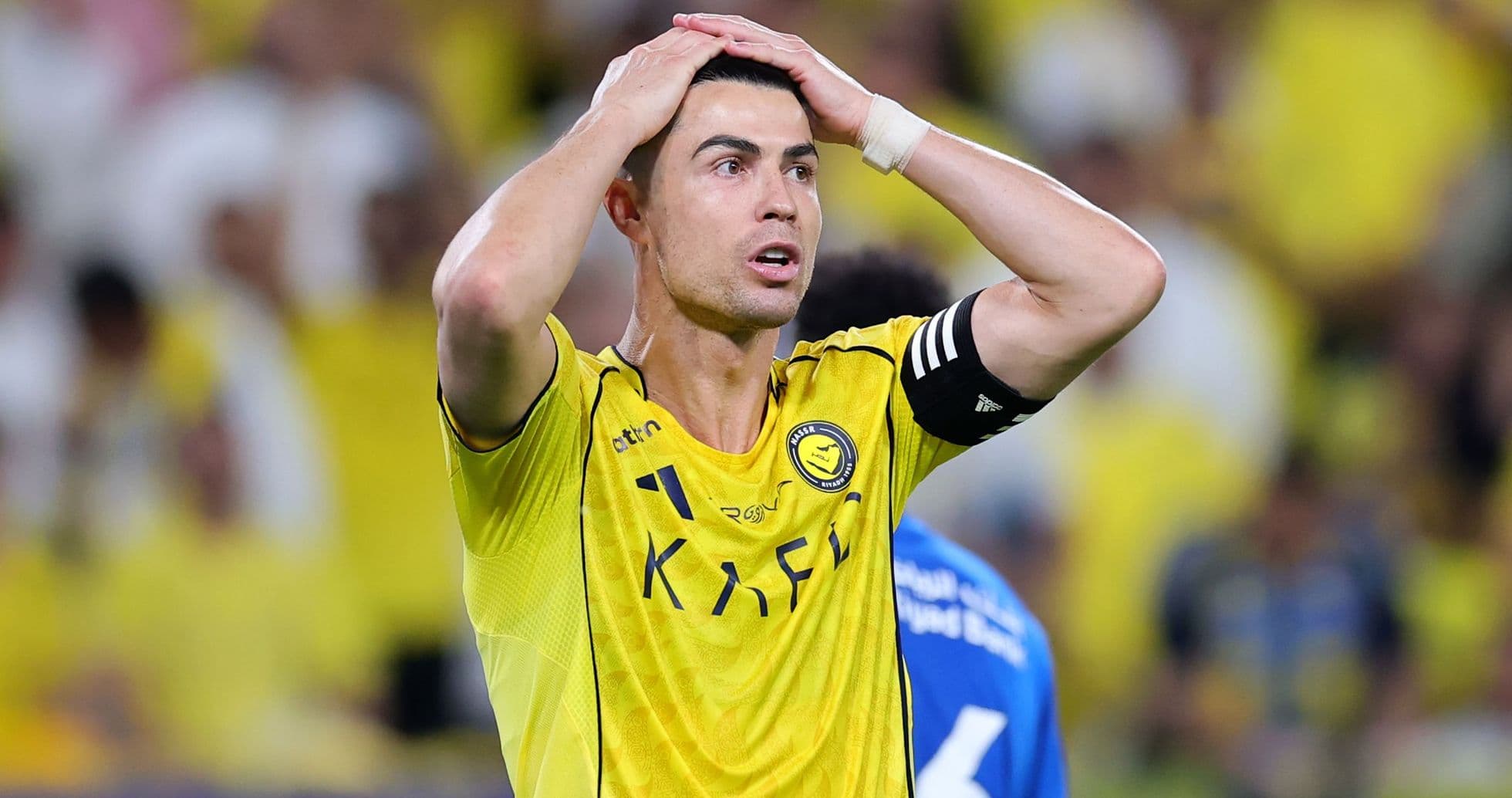 Player in yellow jersey showing frustration during match Player in yellow jersey showing frustration during match