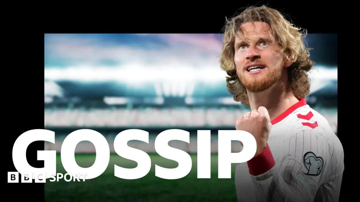 Player celebrating victory in stadium with raised fist Player celebrating victory in stadium with raised fist