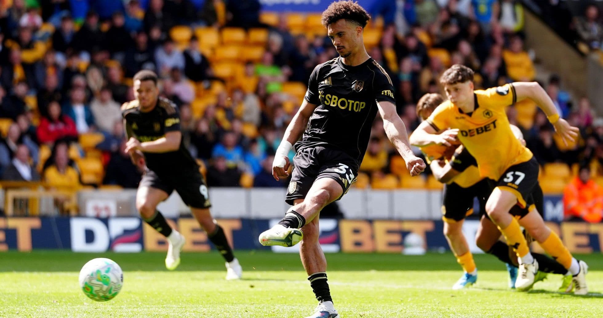 Wolves player taking a penalty kick Wolves player taking a penalty kick
