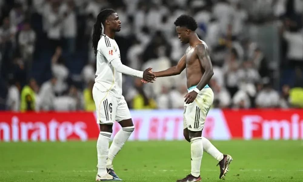 Two players shaking hands after a match Two players shaking hands after a match