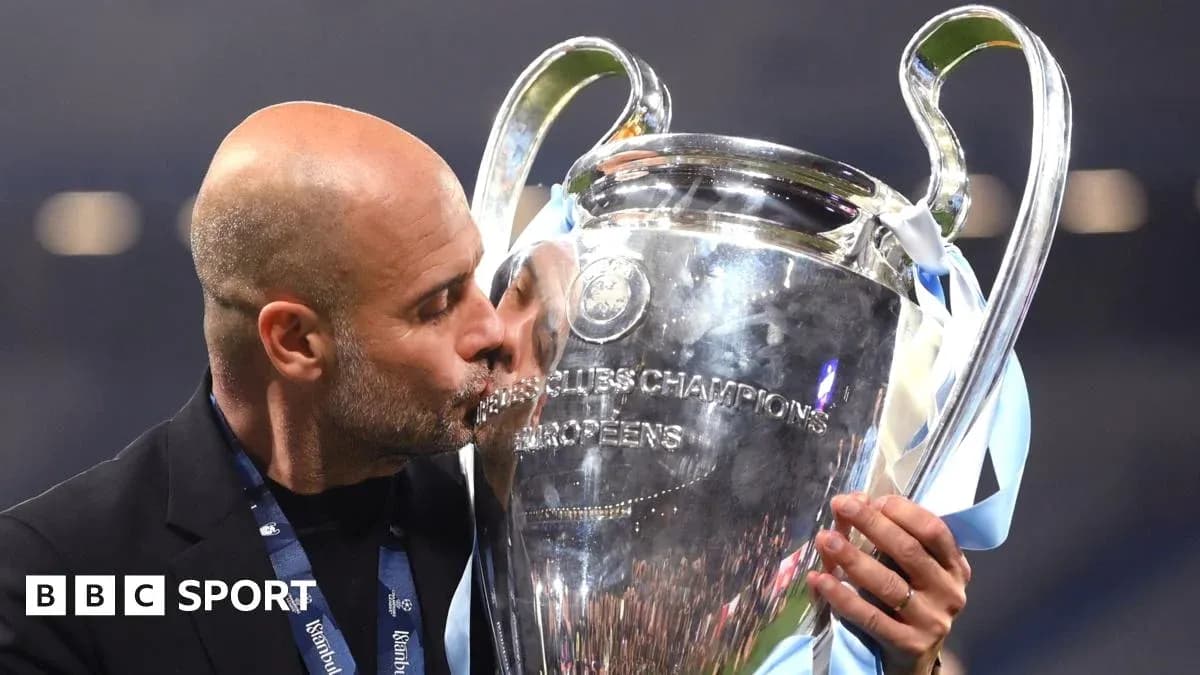 Coach kissing UEFA Champions League trophy Coach kissing UEFA Champions League trophy