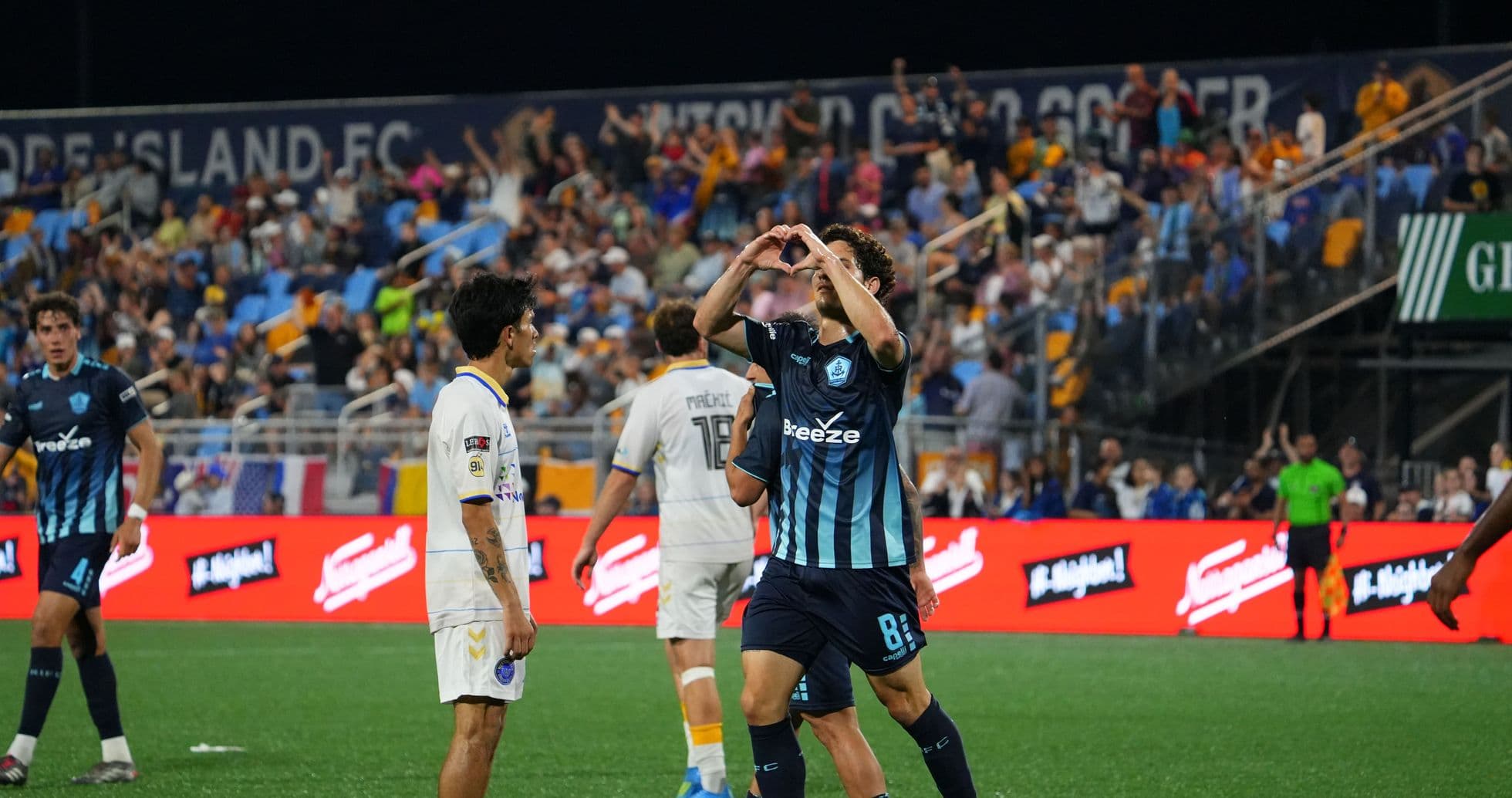 Player celebrating after scoring goal in match Player celebrating after scoring goal in match