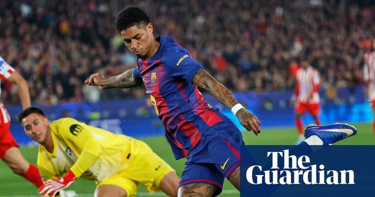 Barcelona player shooting on goal with goalkeeper ready Barcelona player shooting on goal with goalkeeper ready