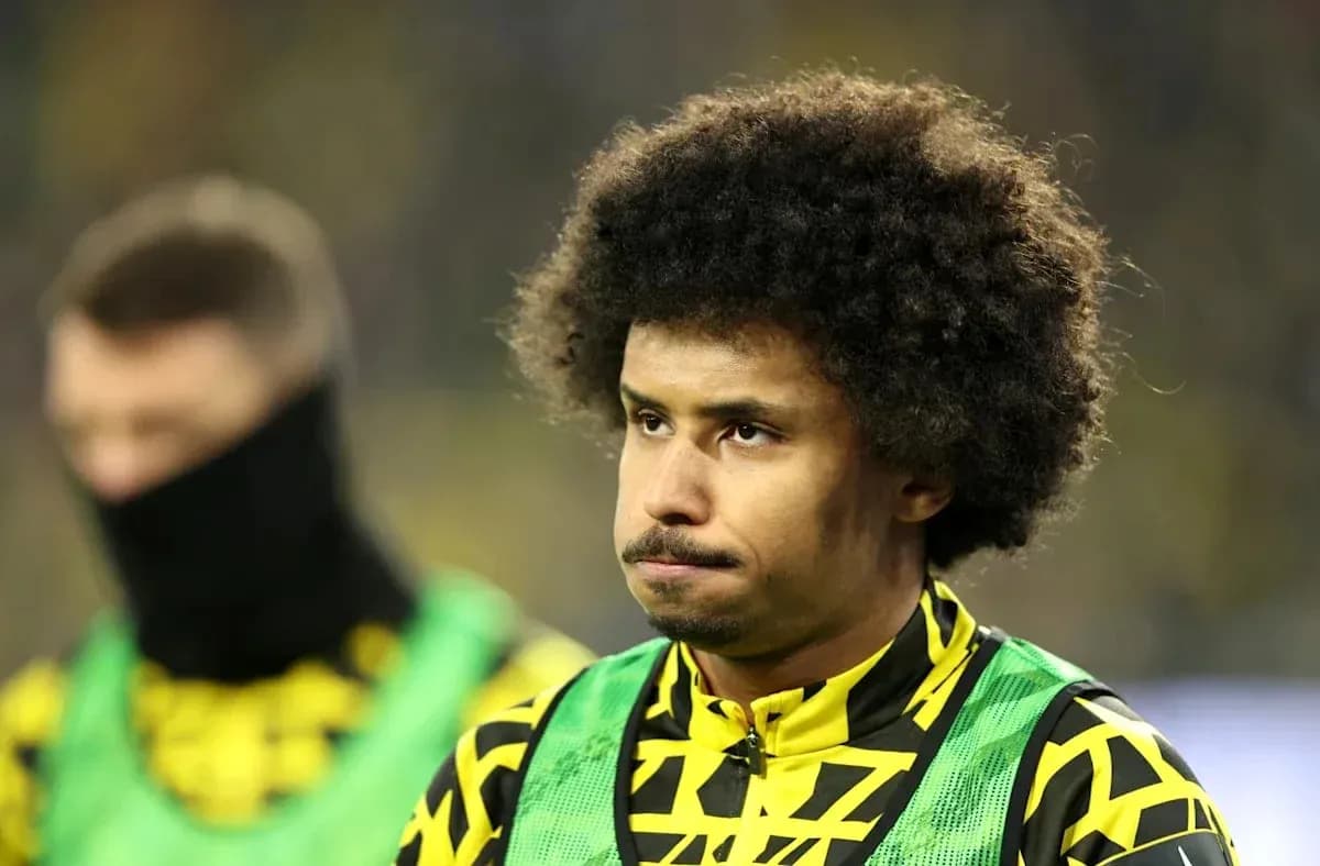 Player in yellow jersey during match warm-up Player in yellow jersey during match warm-up
