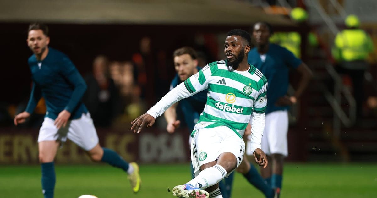 Celtic player dribbling during match with opponents Celtic player dribbling during match with opponents