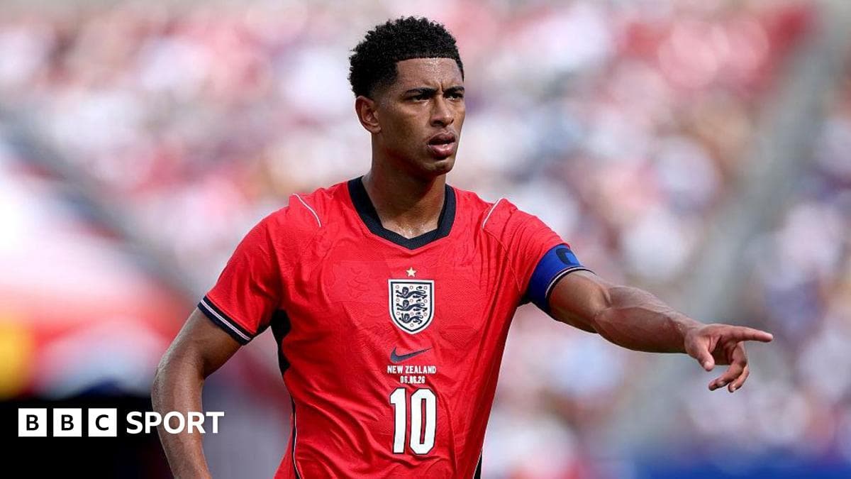 Player in red England jersey pointing during match Player in red England jersey pointing during match
