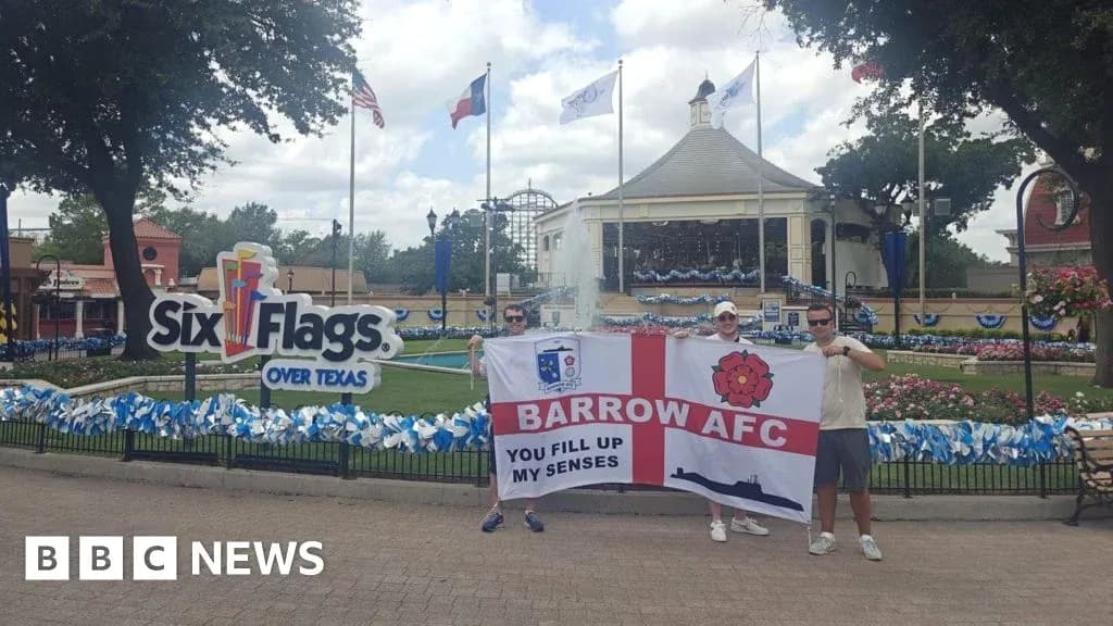 Fans holding Barrow AFC flag at Six Flags Fans holding Barrow AFC flag at Six Flags