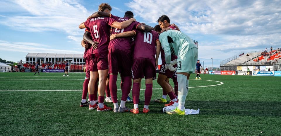 Loudoun United players huddled before match Loudoun United players huddled before match
