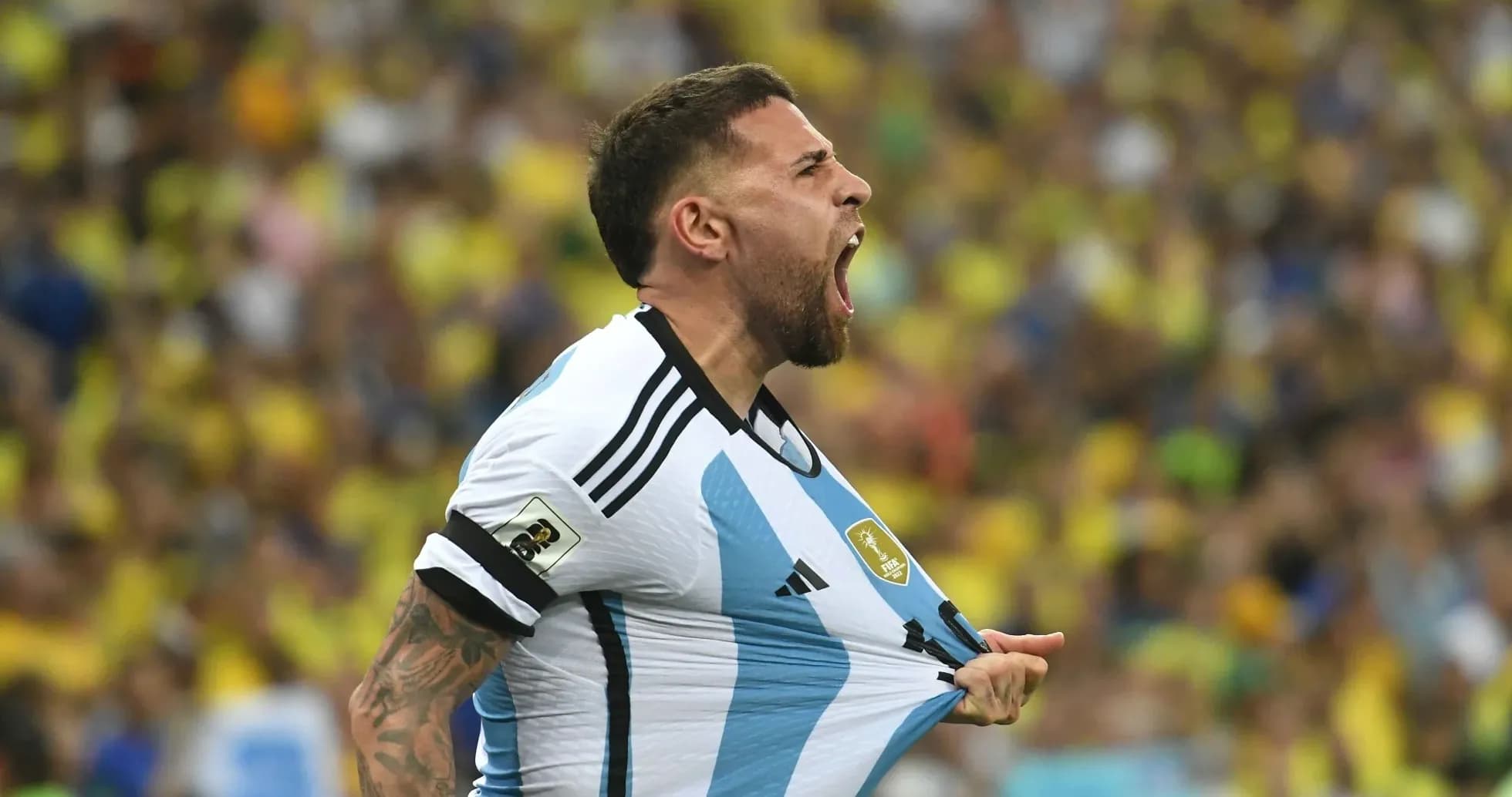 Player celebrating passionately during match in stadium Player celebrating passionately during match in stadium