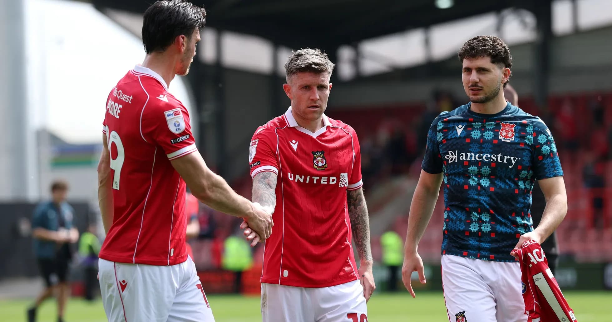 Wrexham players shaking hands after match Wrexham players shaking hands after match