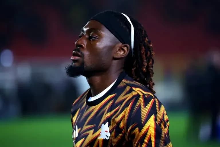 Player in colorful kit on the field Player in colorful kit on the field