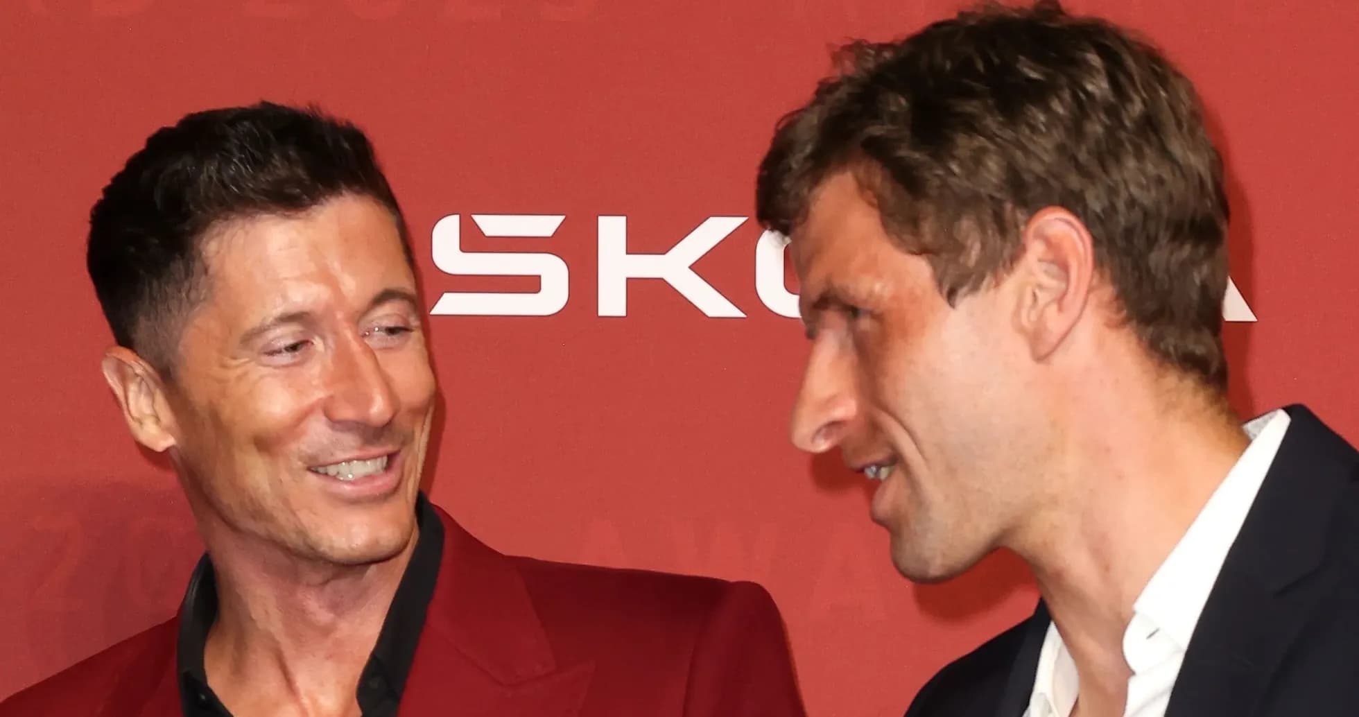 Two men conversing at an awards event Two men conversing at an awards event