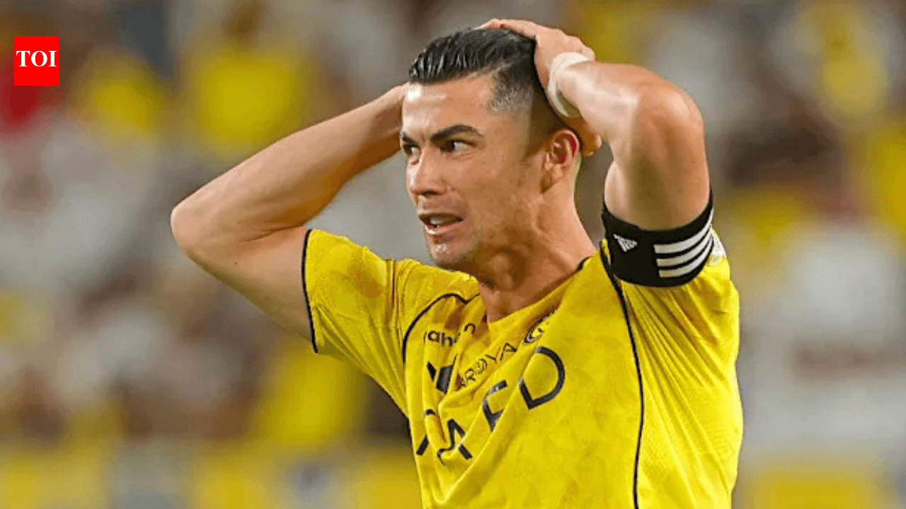 Player with hands on head during match Player with hands on head during match