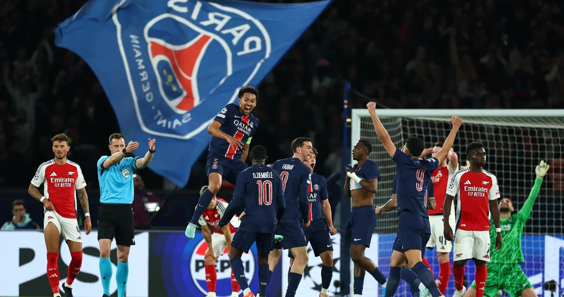 PSG players celebrating victory against Arsenal PSG players celebrating victory against Arsenal