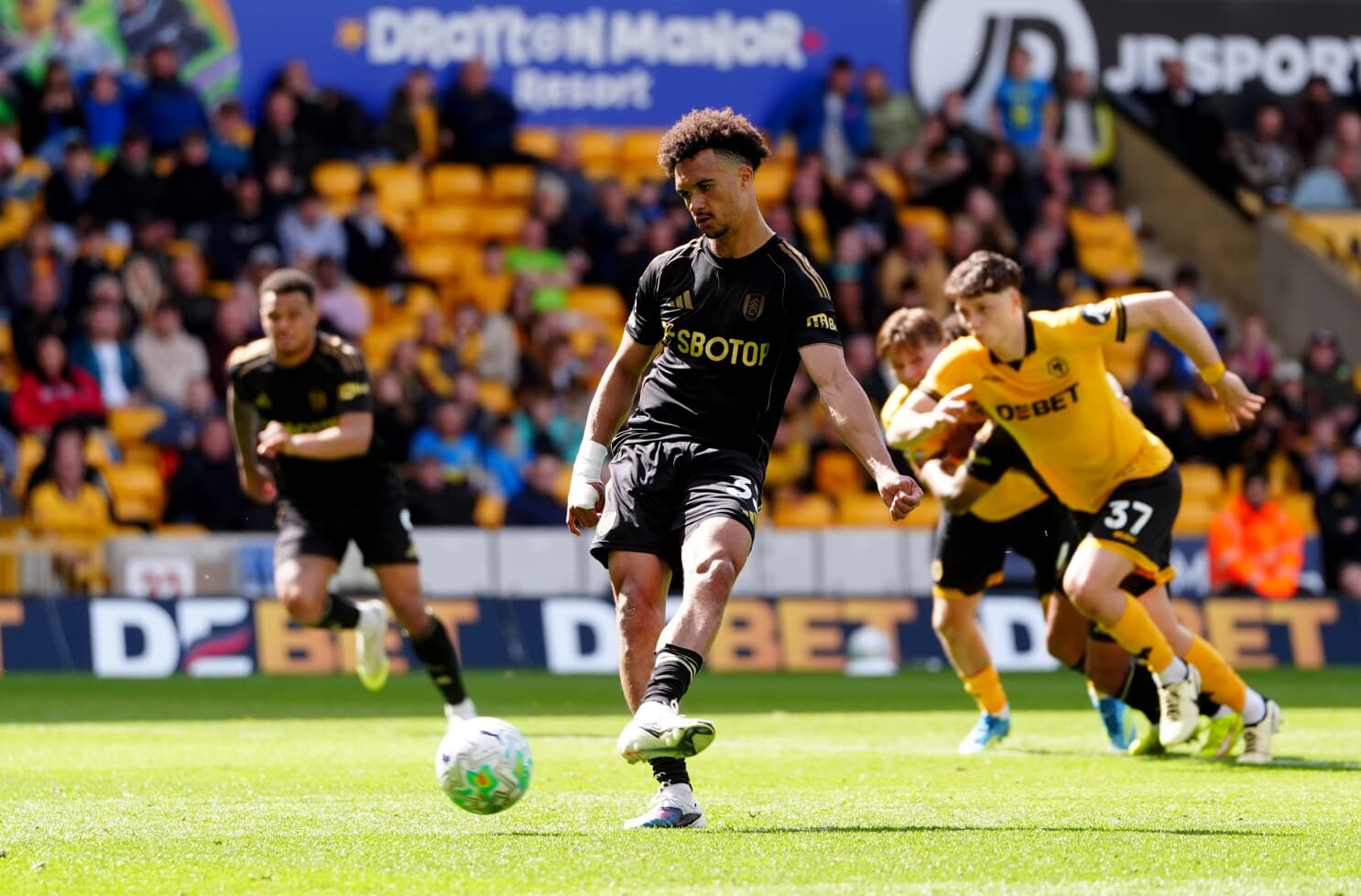 Player taking a penalty kick during match Player taking a penalty kick during match