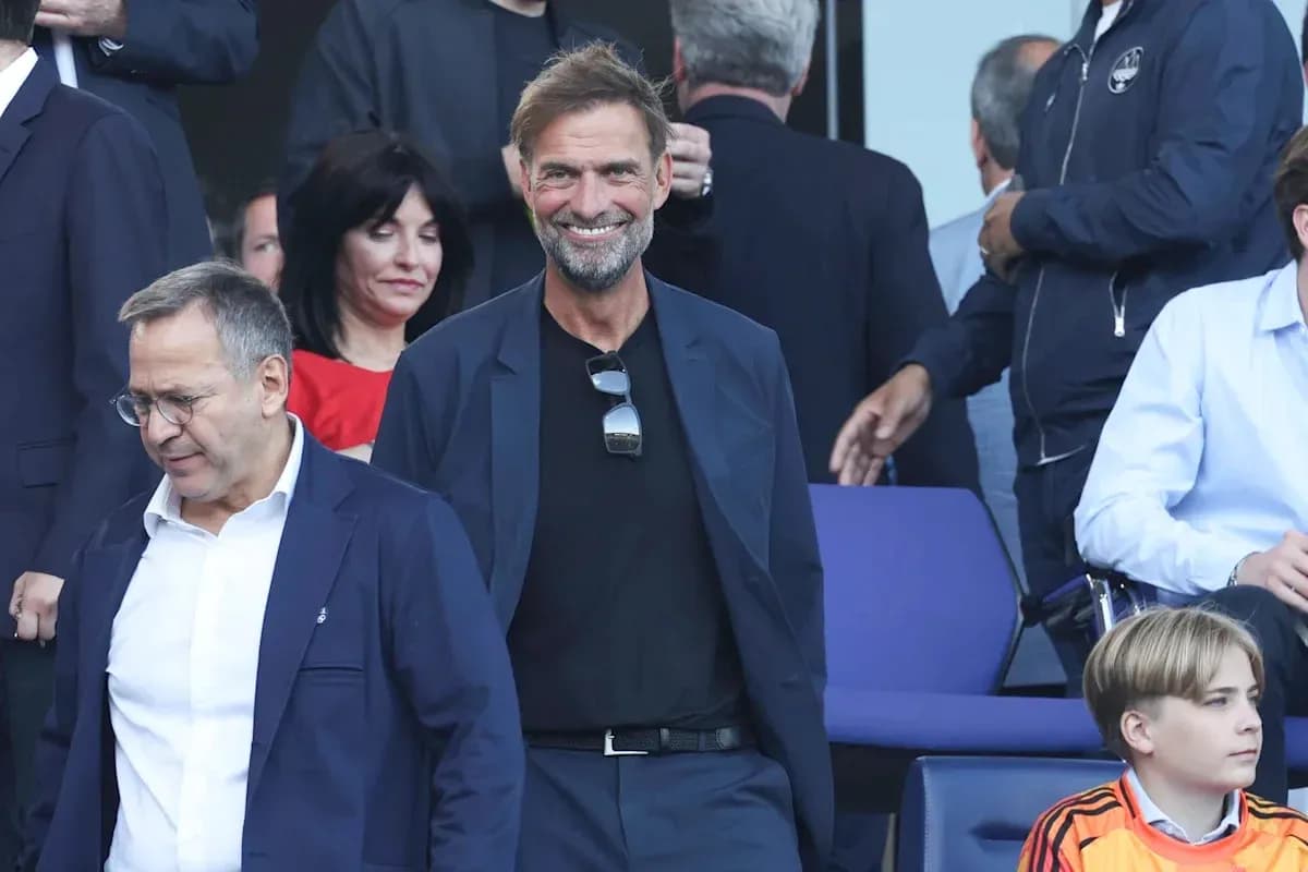 Jurgen Klopp smiling in a crowd at event Jurgen Klopp smiling in a crowd at event