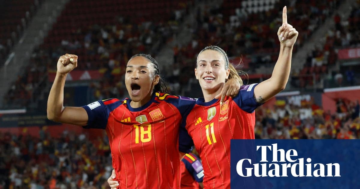 Two Spain players celebrating a goal during match Two Spain players celebrating a goal during match