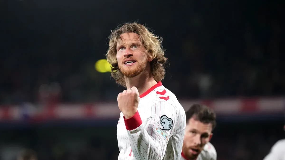Player celebrating after scoring during a match Player celebrating after scoring during a match